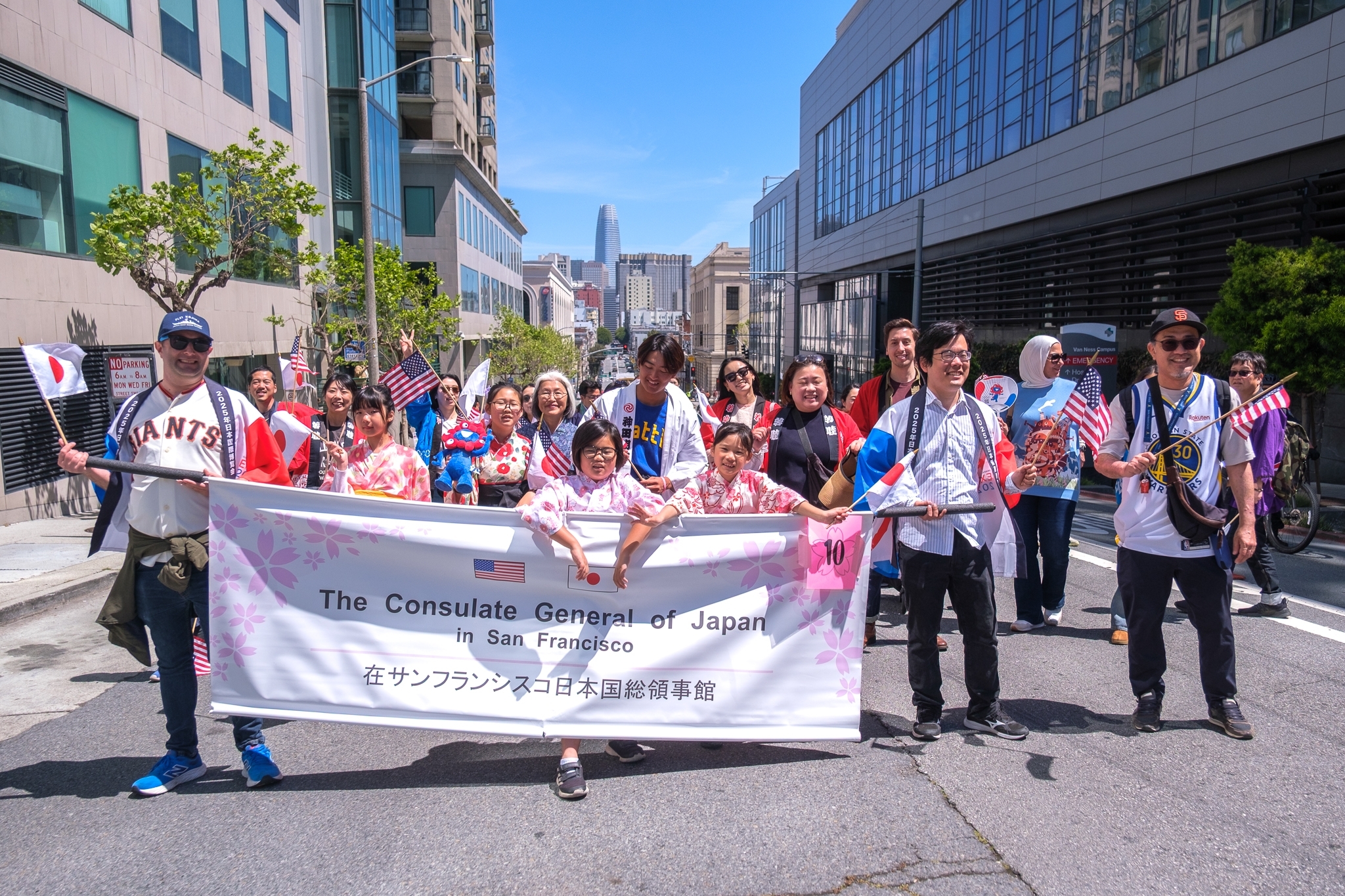 consulate staff members and their families joined the parade